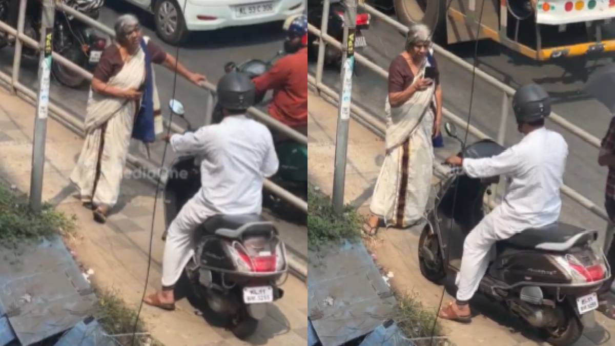 Kozhikode Elderly Woman Stops Scooty Rider Misusing Footpath