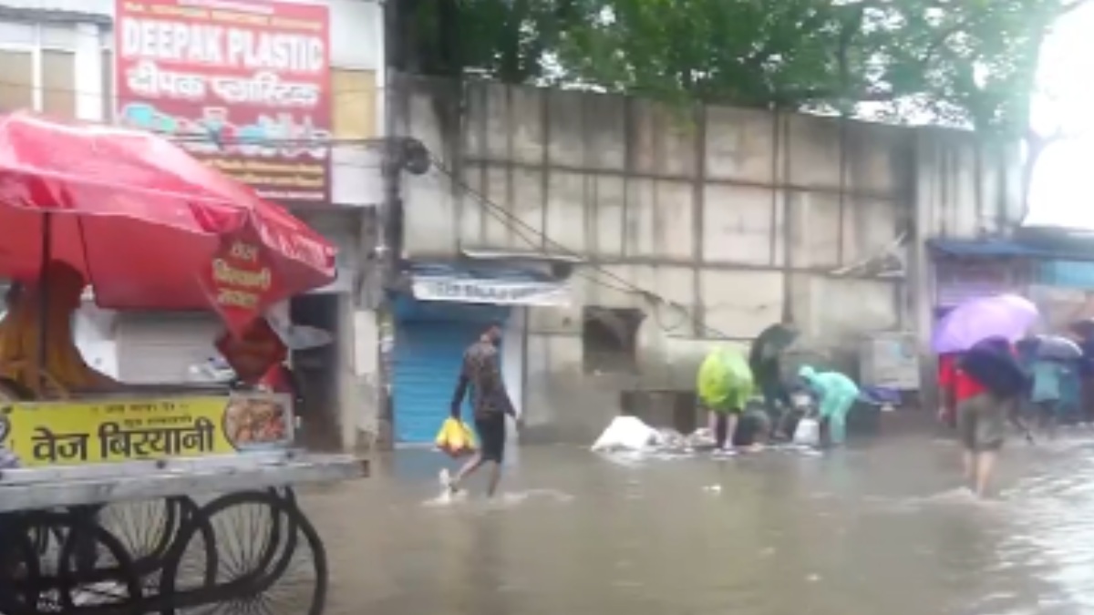 Red Alert in Delhi-NCR: Heavy Rain Forces School Closures, Streets Waterlogged | Photo Credit: https://x.com/PTI_News