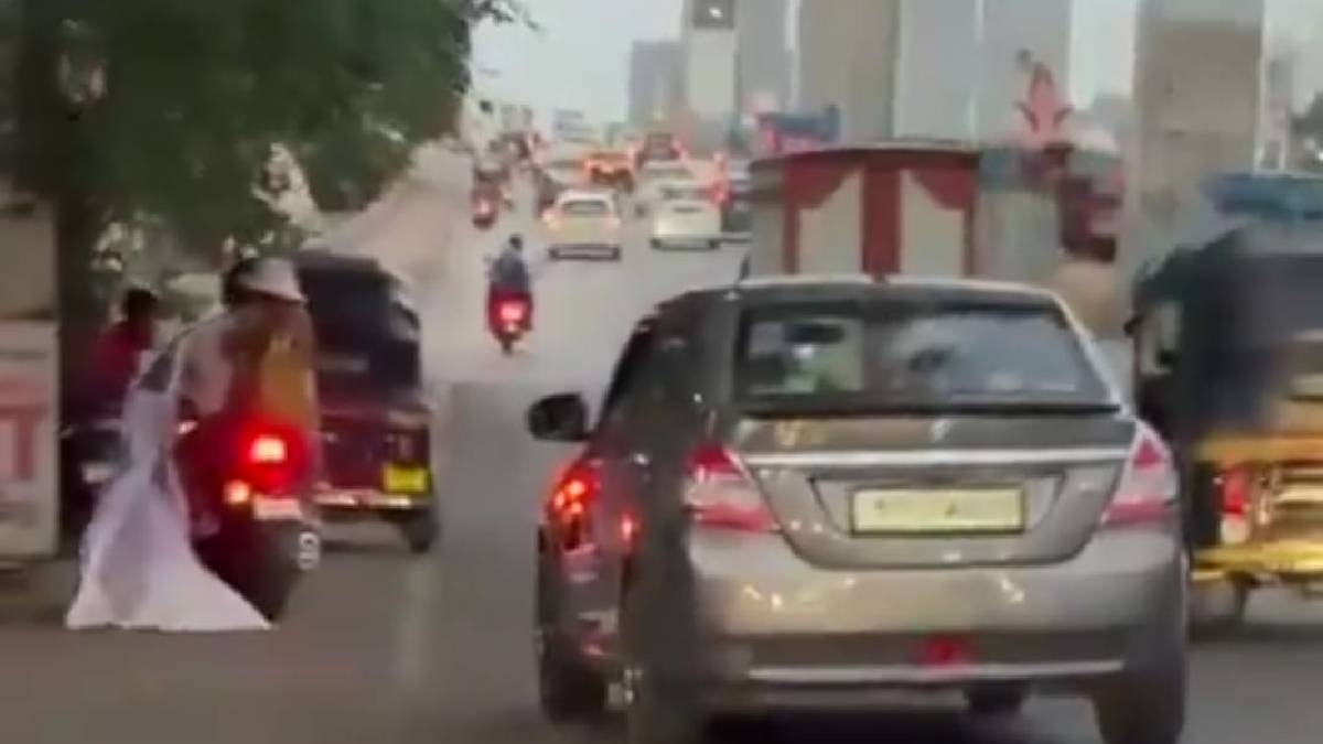 Shocking Escape in Thane as Foot Over Bridge Banner Collapses onto Passing Motorcyclist