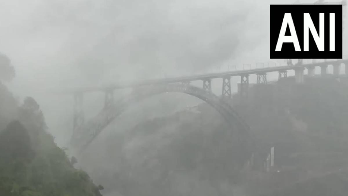 Misty Monsoon Conditions Engulf Chenab Rail Bridge Amid Rainfall in Jammu & Kashmir