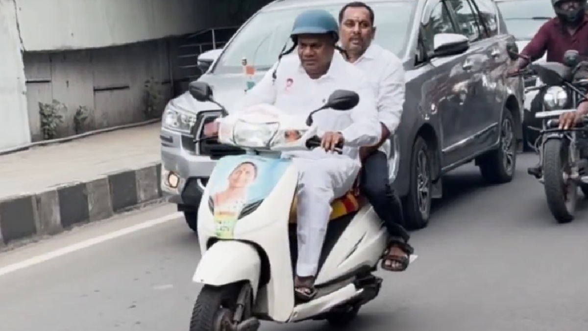 Bussy Anand Uses Two-Wheeler to Reach Dheeran Chinnamalai Tribute Amid Guindy Traffic | Photo Credit: https://x.com/Vignesh_twitz