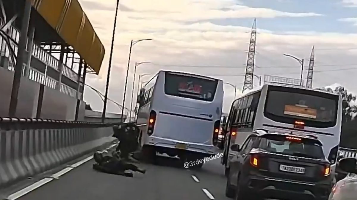 Electronic City Flyover Incident: Bus Clips Two-Wheeler During Overtake, Rider Escapes With Minor Injuries