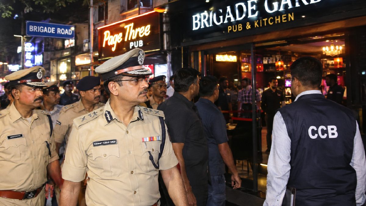 Bengaluru police conduct a late-night pub inspection on Brigade Road.