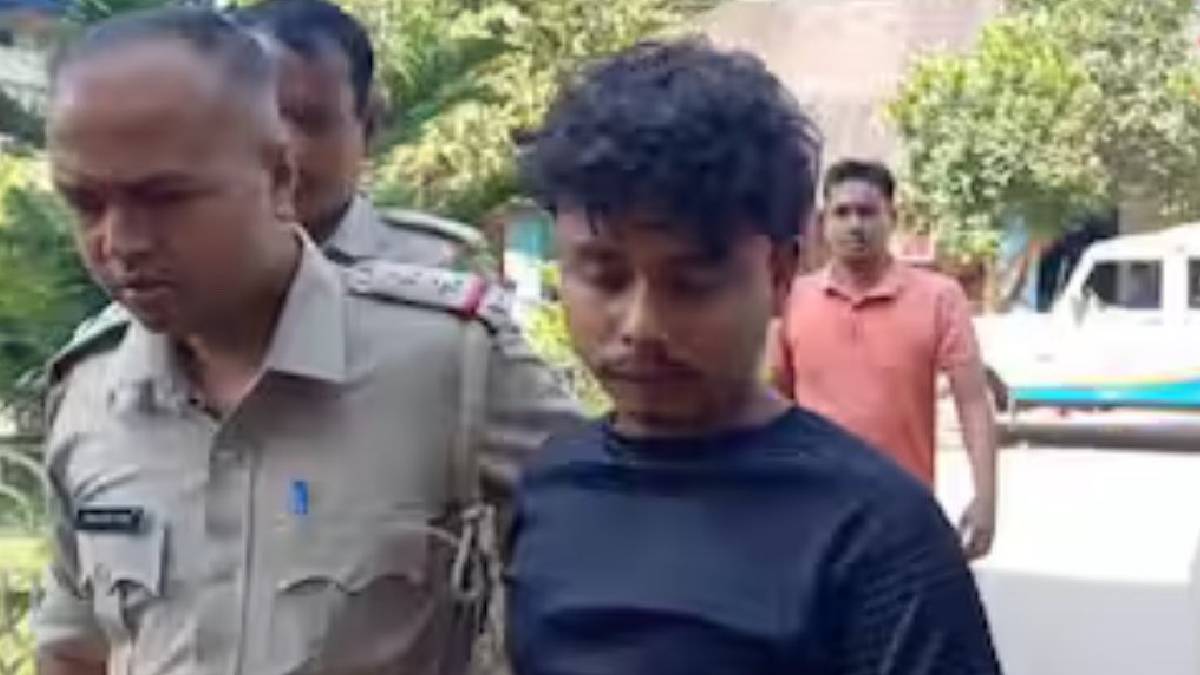 The Accused Being Escorted By Officers